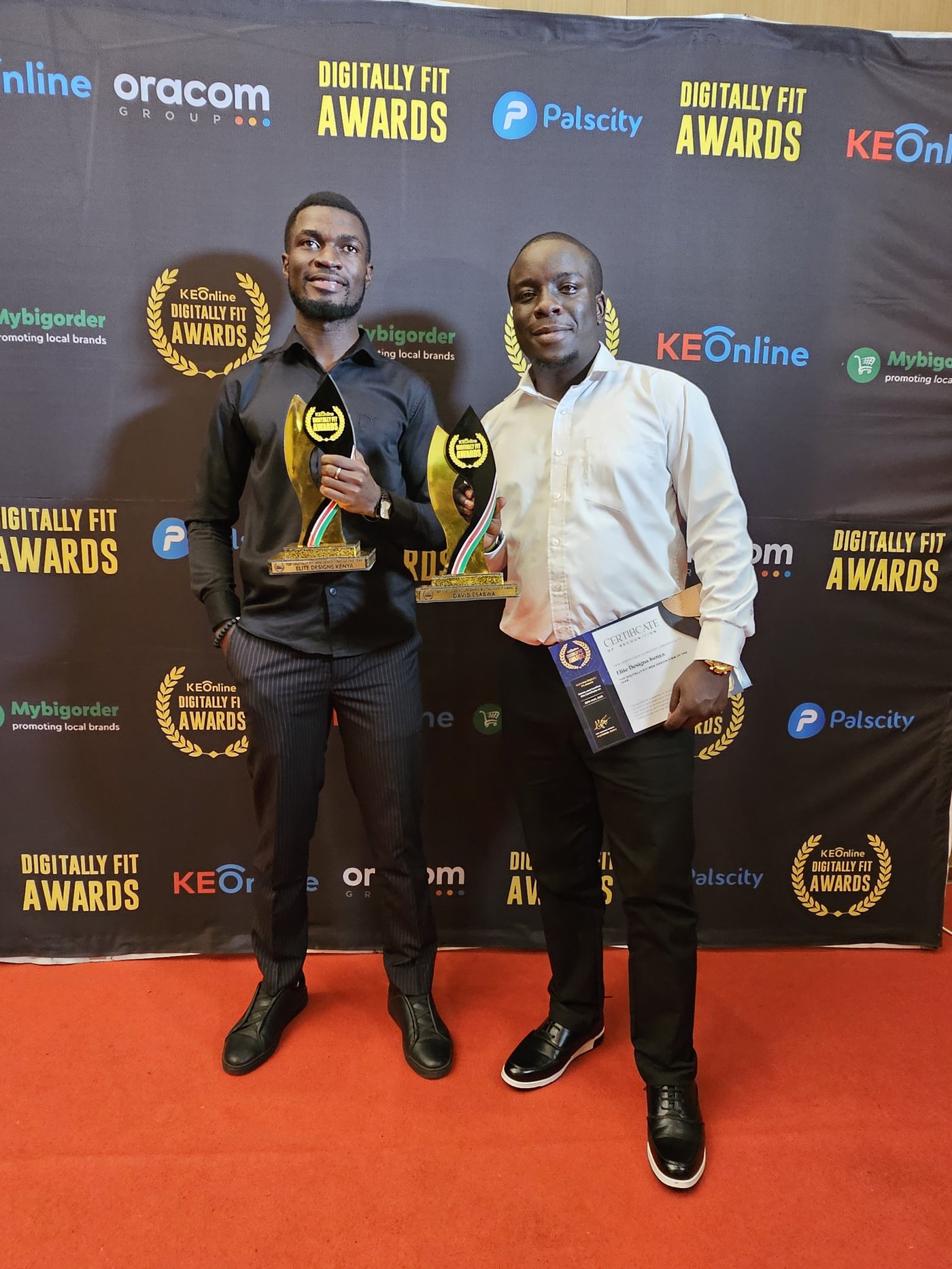 David Esabwa and the Elite Designs Kenya team with their Digitally Fit Awards trophies